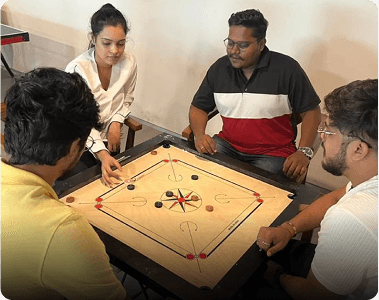 Team Playing Carrom